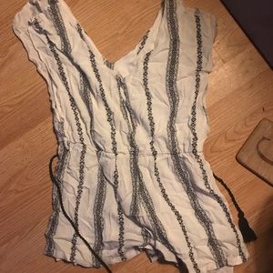 Large cream and black romper with belt